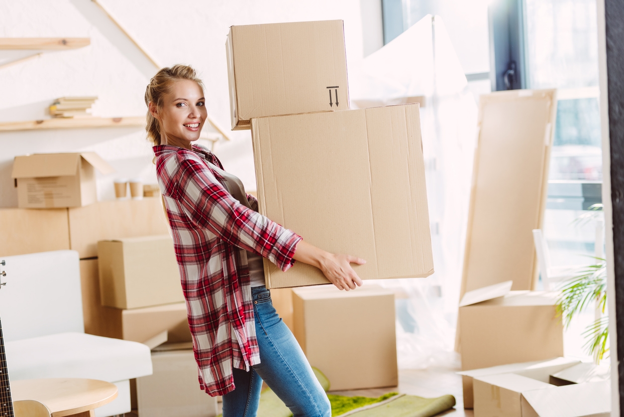 girl with cardboard boxes