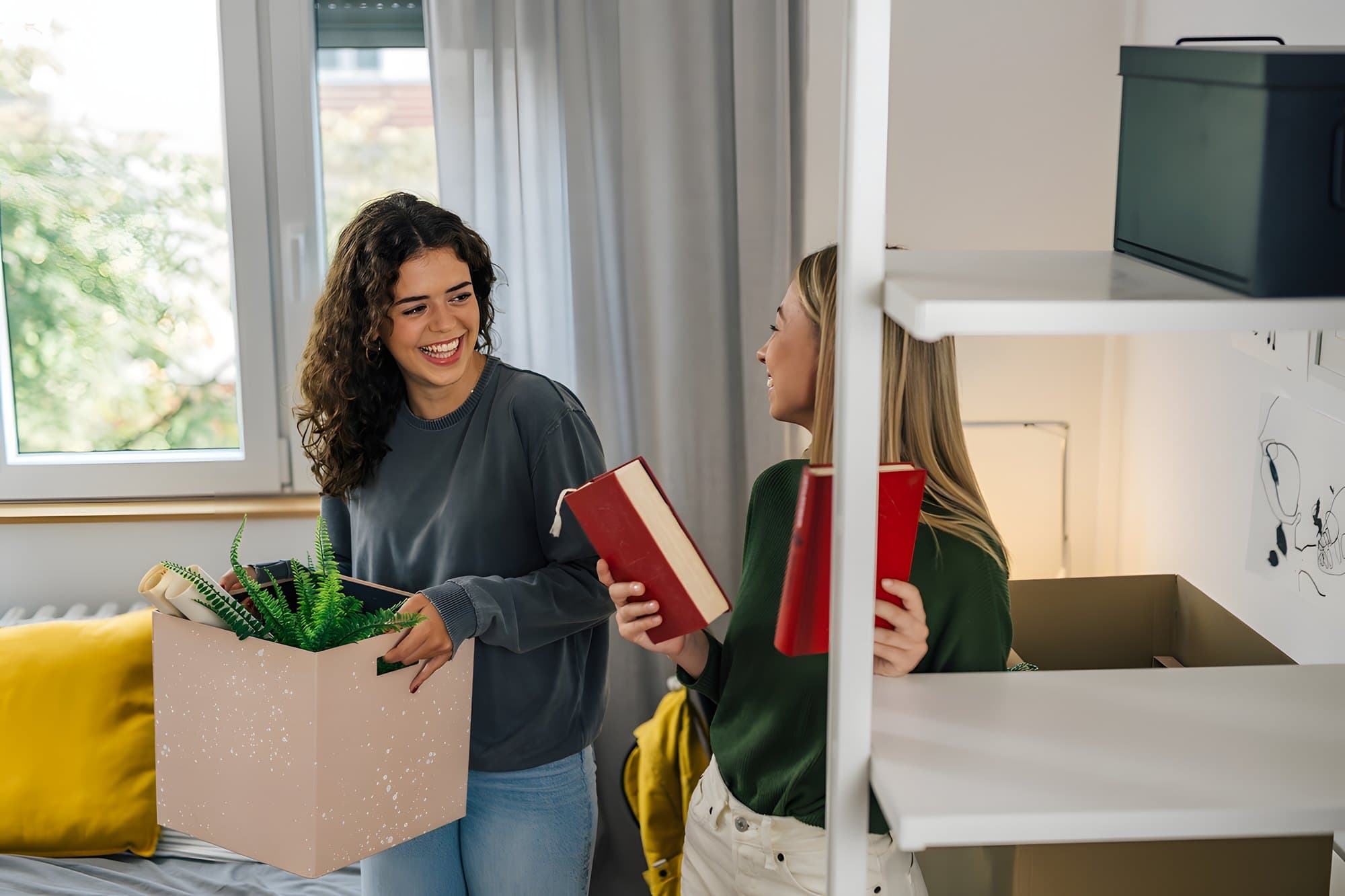 female students in dorm room